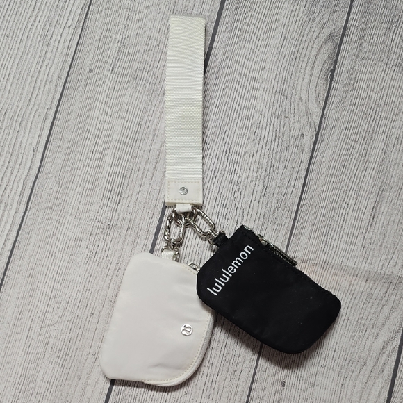 EUC Lululemon Dual Pouch Wristlet White/ Black